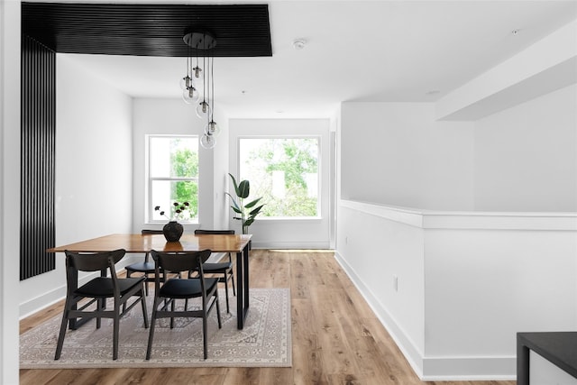 dining space featuring light wood-type flooring