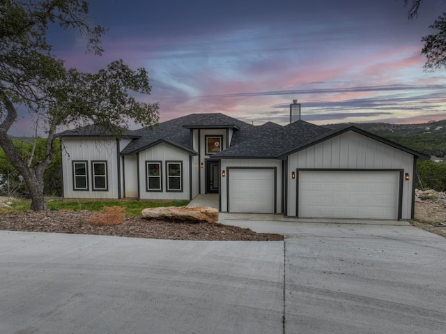 view of front of home with a garage