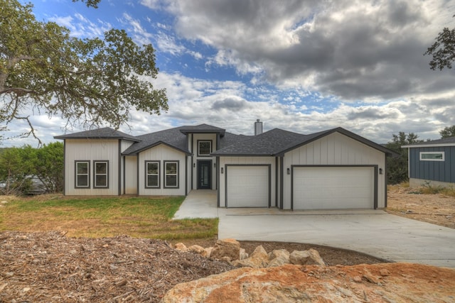 view of front of home with a garage