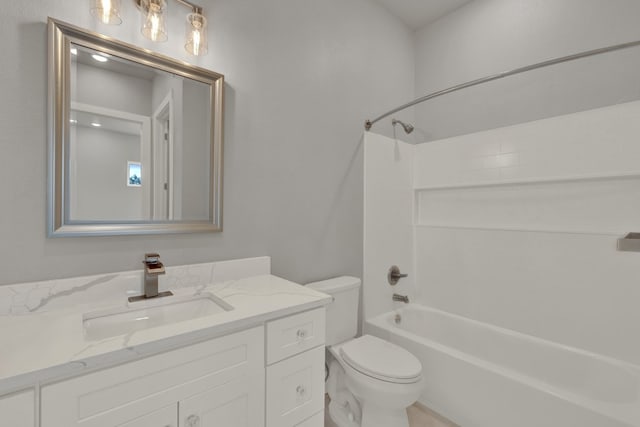 full bathroom featuring toilet, shower / washtub combination, and vanity