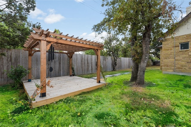 view of yard with a deck and a pergola