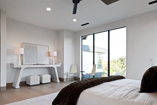300 Stonewall Ln, Austin, TX 78746 - bedroom featuring wood finished floors, recessed lighting, and baseboards