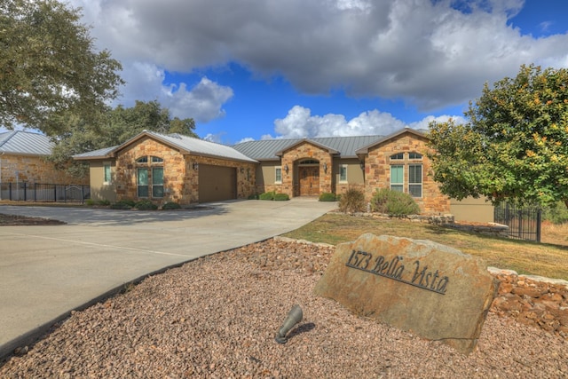 ranch-style home featuring a garage