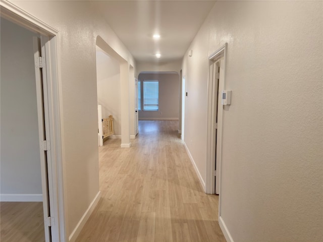 hallway featuring light hardwood / wood-style floors