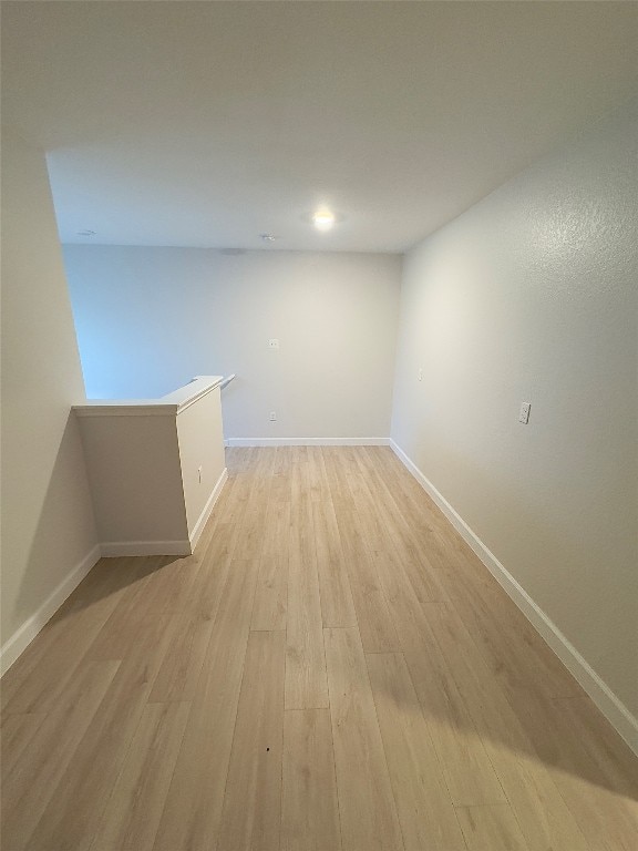 unfurnished room featuring light hardwood / wood-style flooring