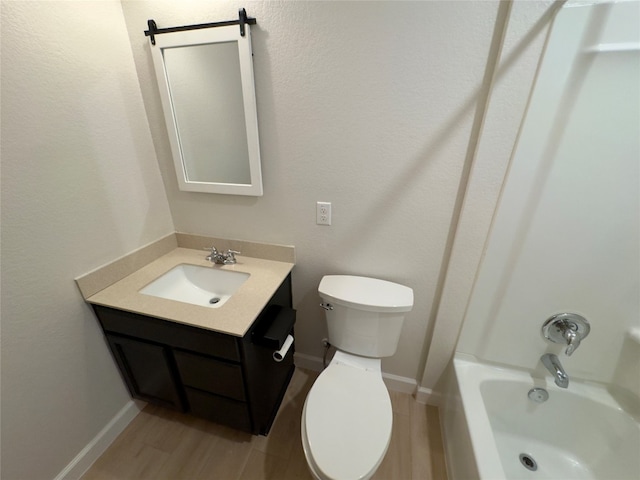 full bathroom featuring vanity, wood-type flooring, toilet, and shower / bath combination