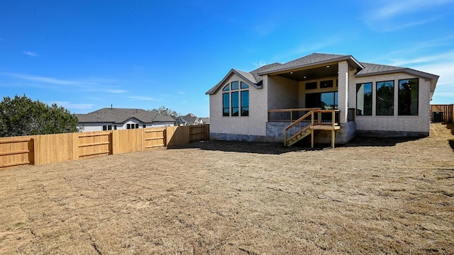 920 Teakmill Trl, San Marcos, TX 78666 - back of house featuring a fenced backyard and central AC unit