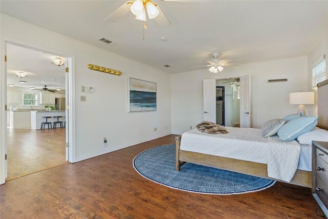 bedroom featuring ceiling fan and hardwood / wood-style flooring