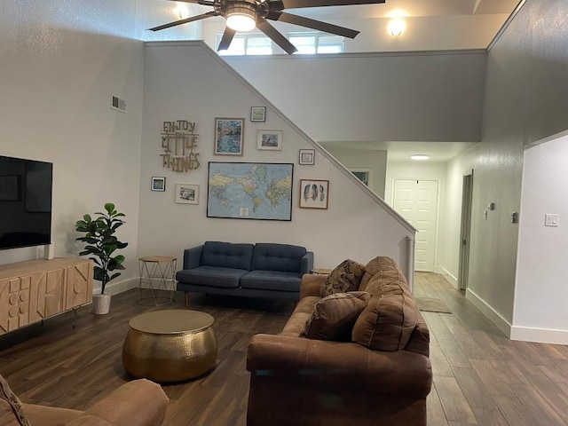 12404 Sceptre Cv, Austin, TX 78727 - living area with a towering ceiling, ceiling fan, wood finished floors, and stairway