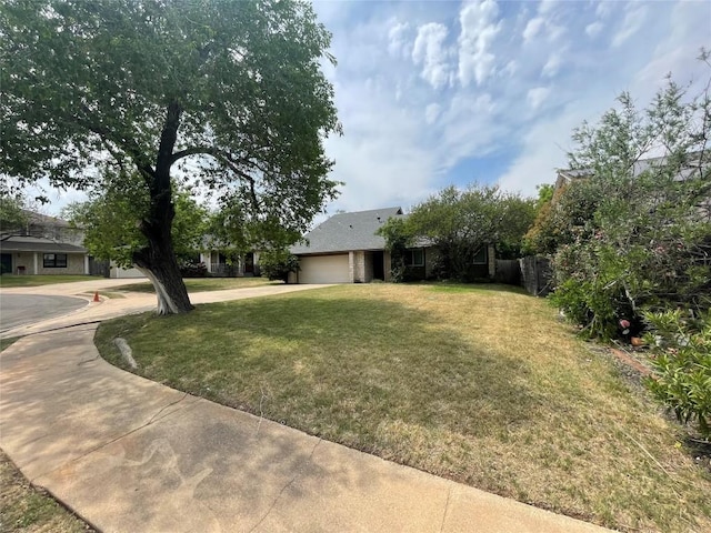 12404 Sceptre Cv, Austin, TX 78727 - view of front of house with an attached garage and driveway