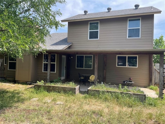12404 Sceptre Cv, Austin, TX 78727 - view of front of house with a patio area and roof with shingles