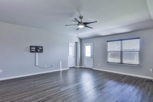 spare room with dark hardwood / wood-style floors and ceiling fan