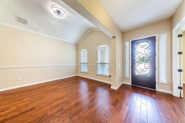 foyer with lofted ceiling and dark hardwood / wood-style flooring