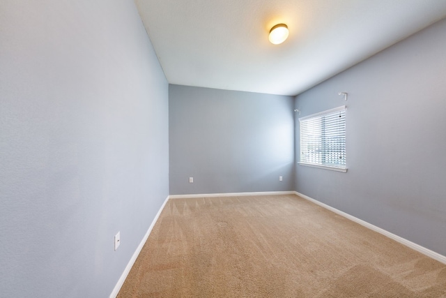 unfurnished room featuring carpet flooring