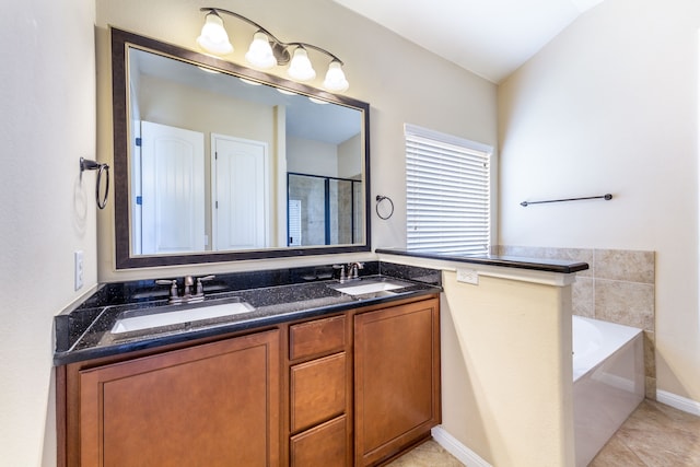 bathroom with tile patterned flooring, vanity, vaulted ceiling, and independent shower and bath