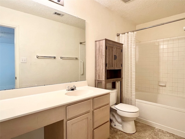 full bathroom with a textured ceiling, toilet, vanity, shower / tub combo with curtain, and tile patterned flooring