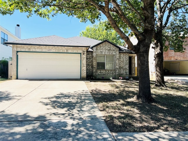 single story home featuring a garage