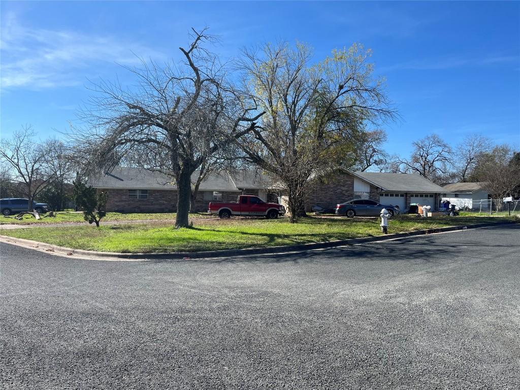1701 Shadowview Dr, Austin, TX 78758 - ranch-style house featuring a garage and driveway