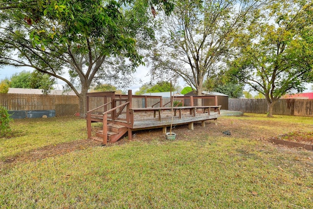 view of yard featuring a wooden deck