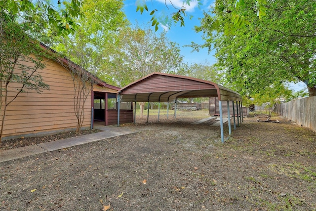 view of yard featuring a carport