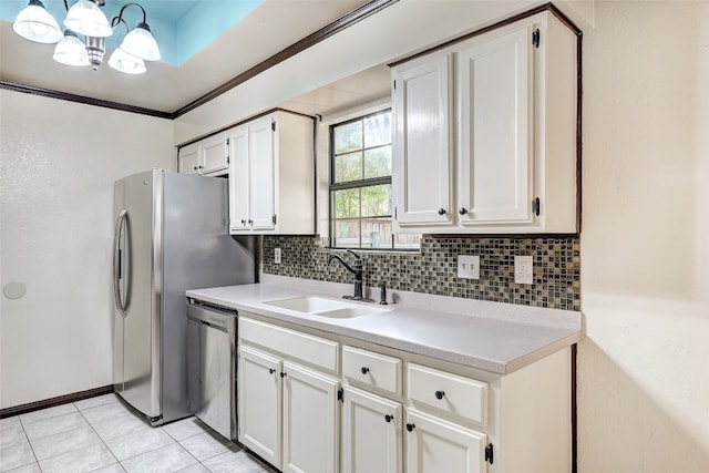 kitchen with dishwasher, sink, hanging light fixtures, white cabinets, and ornamental molding