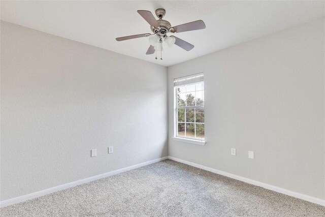 7537 S Glenn St, Austin, TX 78744 - carpeted empty room featuring baseboards and a ceiling fan