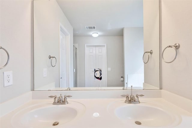 7537 S Glenn St, Austin, TX 78744 - bathroom featuring double vanity