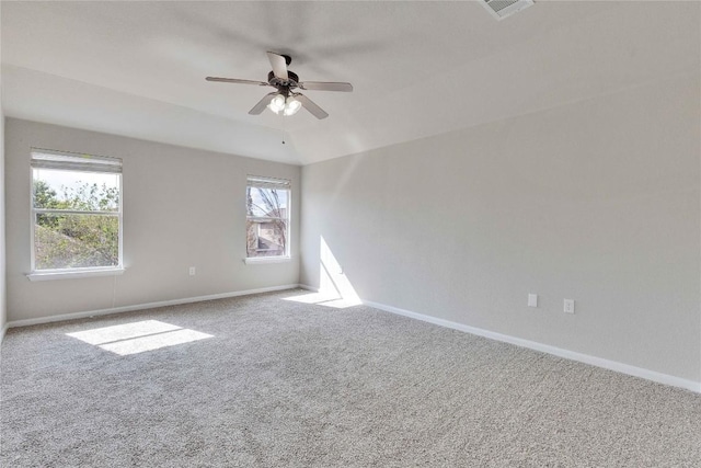 7537 S Glenn St, Austin, TX 78744 - unfurnished room featuring carpet floors, plenty of natural light, and a ceiling fan