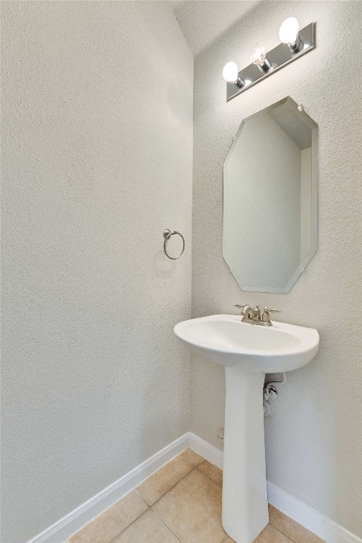 bathroom featuring tile patterned flooring