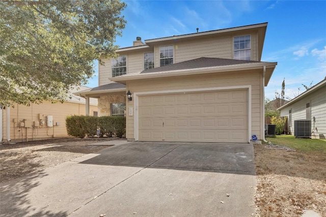 7537 S Glenn St, Austin, TX 78744 - traditional-style home featuring central AC unit, a garage, driveway, and a chimney