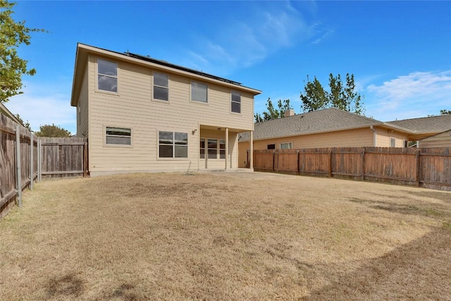 7537 S Glenn St, Austin, TX 78744 - rear view of house featuring a fenced backyard