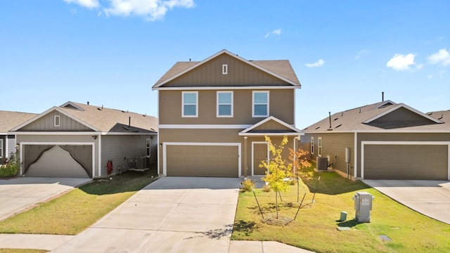 craftsman house featuring cooling unit, a front yard, and a garage