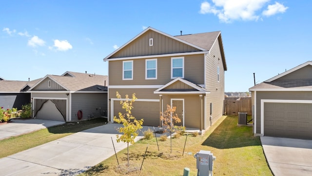 view of front of home featuring a front yard and cooling unit