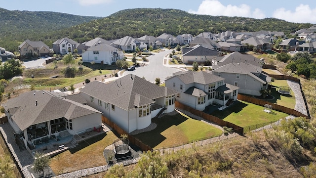 birds eye view of property with a mountain view