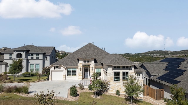 french country home with a garage