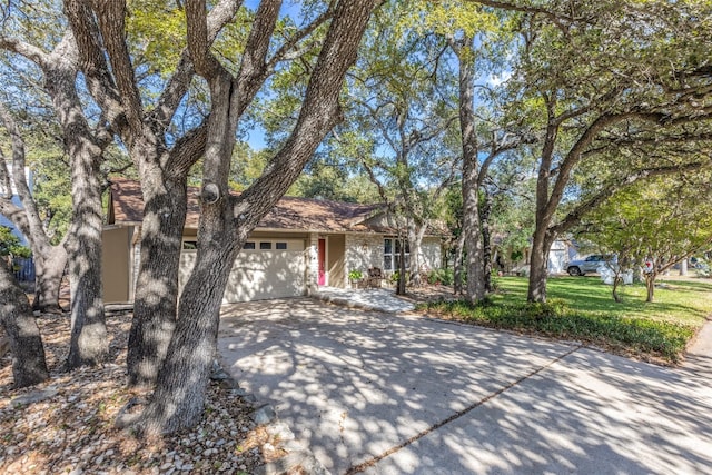 view of front of home featuring a garage