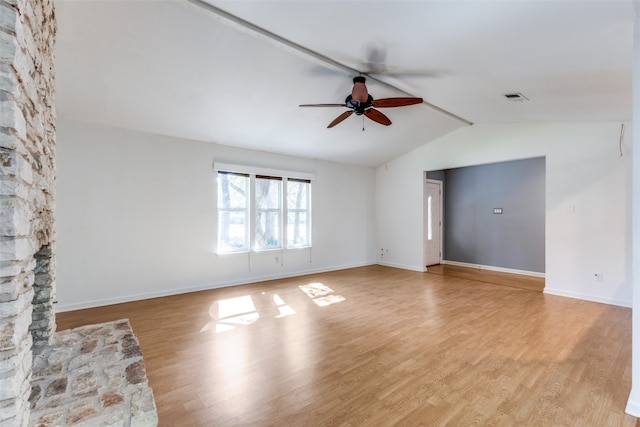 unfurnished living room with lofted ceiling, ceiling fan, and light hardwood / wood-style flooring