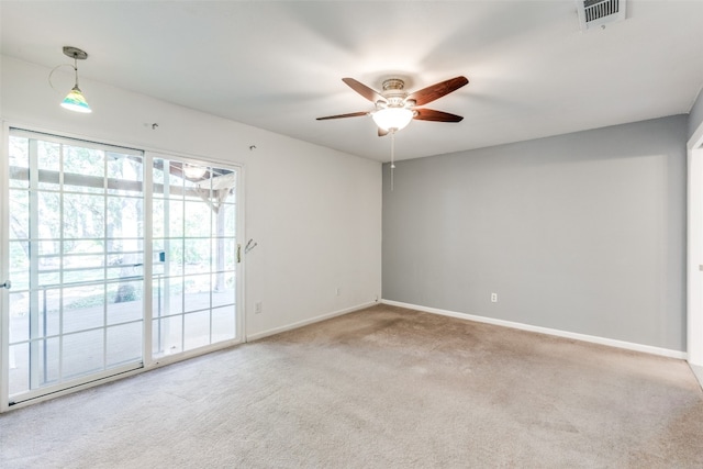 unfurnished room with carpet and ceiling fan