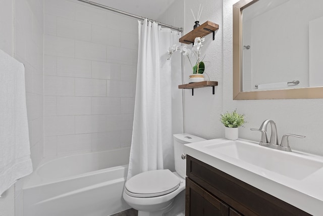 full bathroom with vanity, toilet, and shower / bath combo with shower curtain