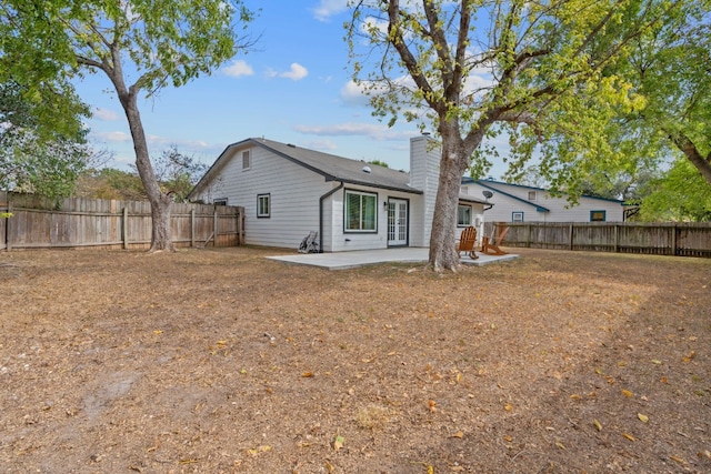 rear view of property with a patio