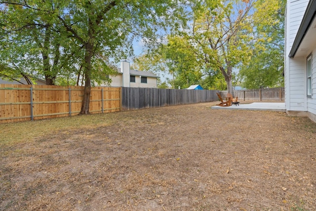 view of yard with a patio area