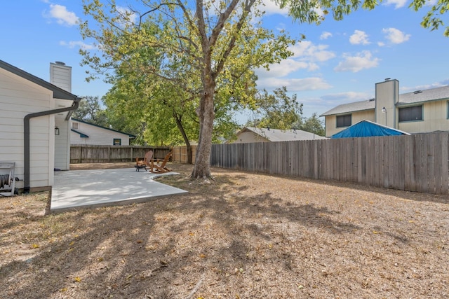 view of yard with a patio area