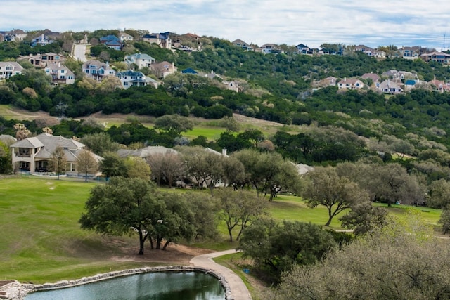 aerial view featuring a water view and a residential view