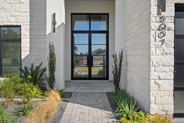 entrance to property with french doors