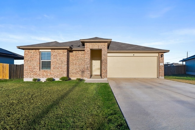 view of front of property with a garage, concrete driveway, fence, and a front lawn