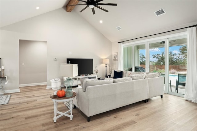 living room with light hardwood / wood-style flooring, beam ceiling, high vaulted ceiling, and ceiling fan