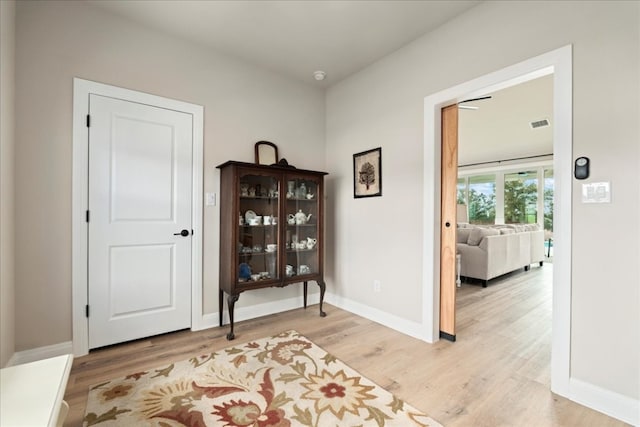 sitting room featuring hardwood / wood-style flooring