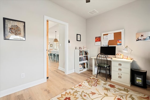 office area featuring light hardwood / wood-style flooring