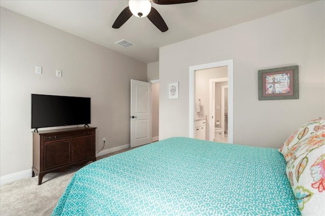 bedroom featuring connected bathroom, ceiling fan, and carpet floors