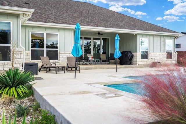 back of property featuring a patio area and ceiling fan